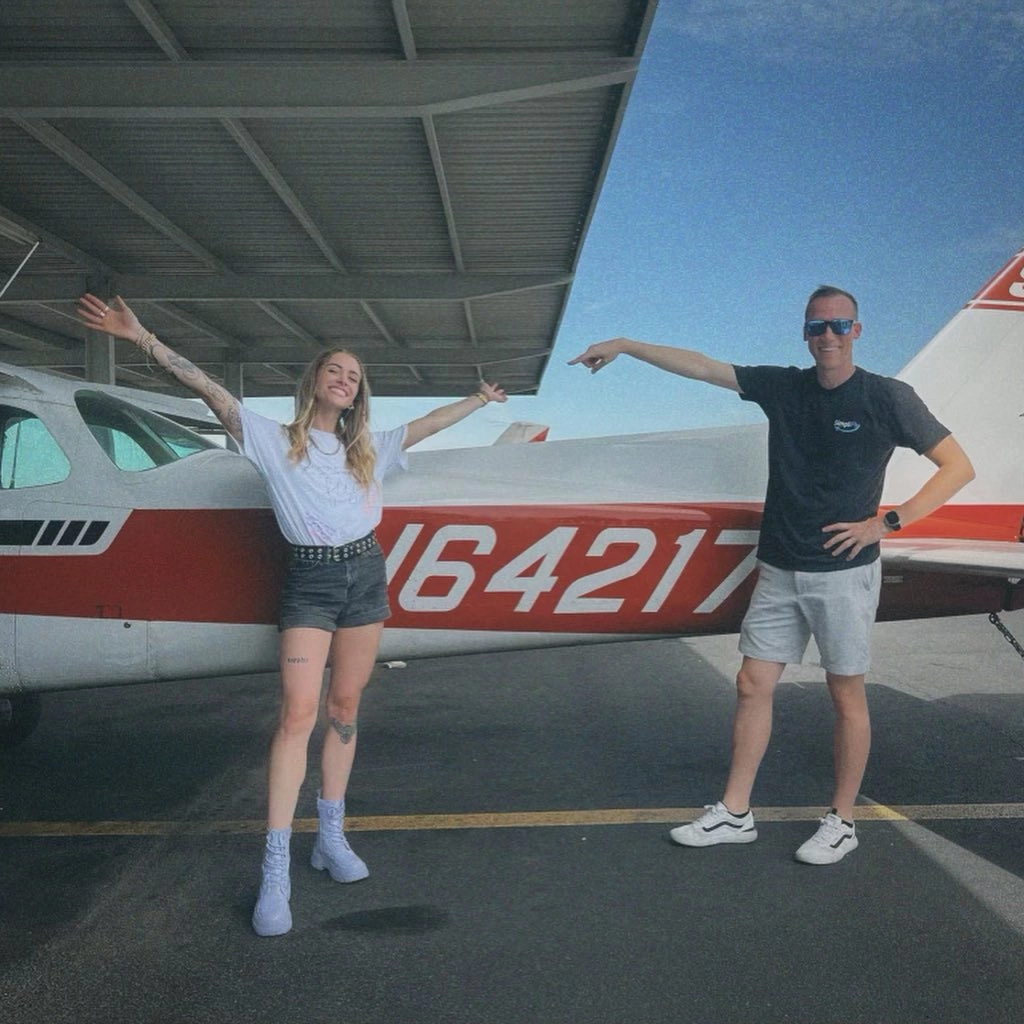 SimpliFly Flight School airplane landing at Falcon Field Airport in Mesa, Arizona