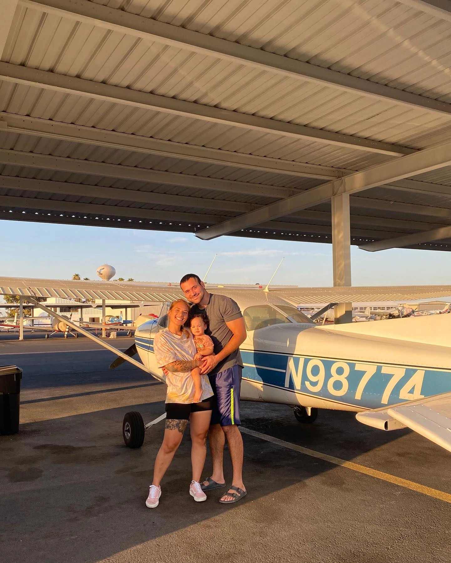 Certified flight instructor assisting a student pilot in a safe training environment