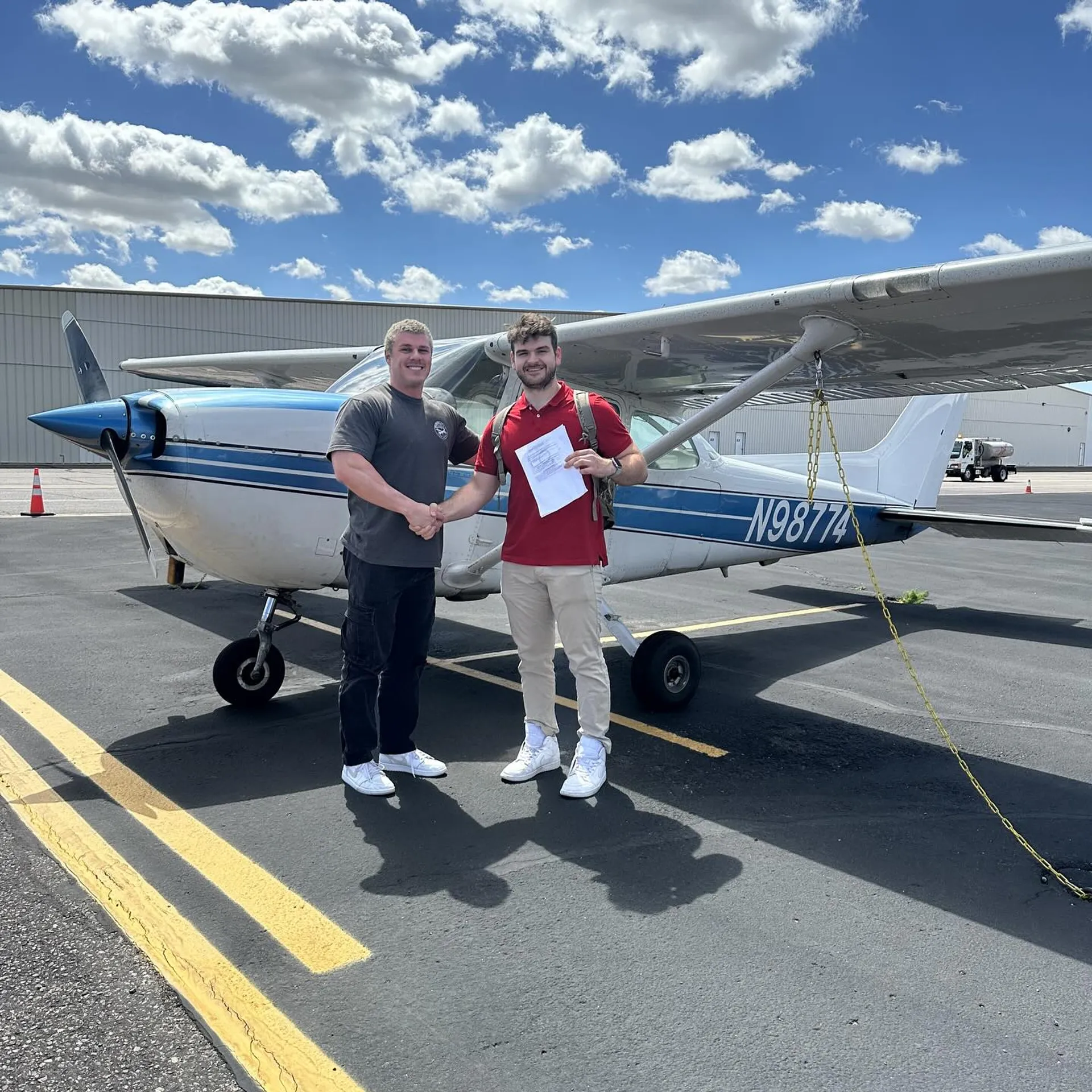 SimpliFly Flight School Team at the runway