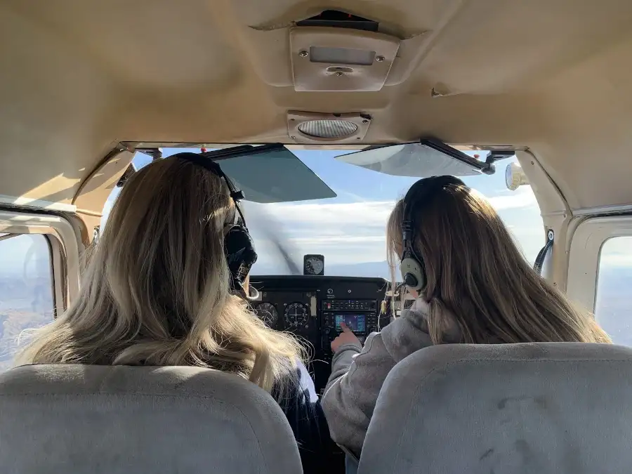 SimpliFly Flight School student and flight instructor in a Cessna airplane cockpit
