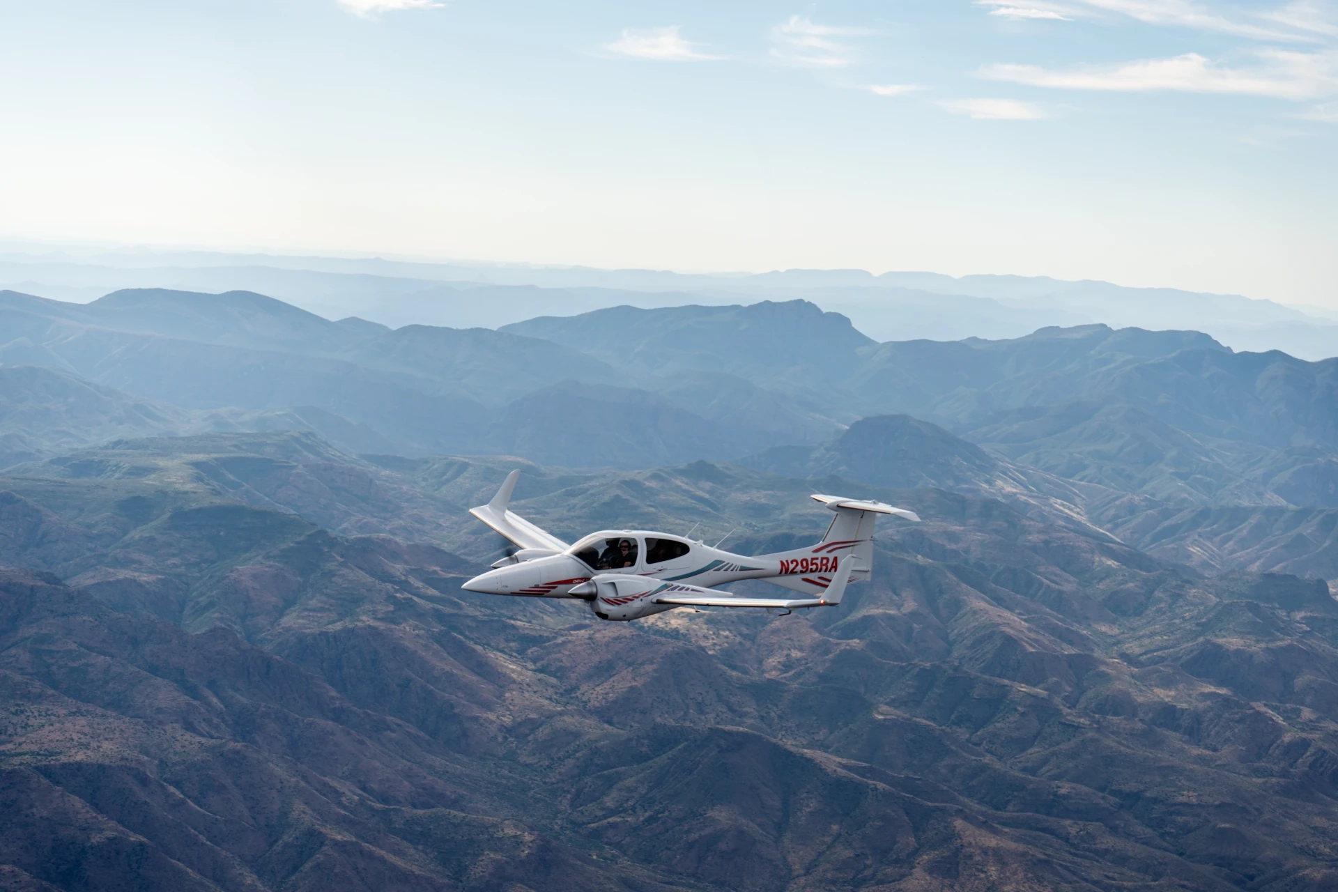 Multi-engine airplane flying over Arizona