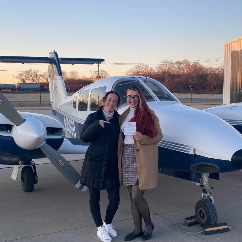 SimpliFly Flight School Team at the runway