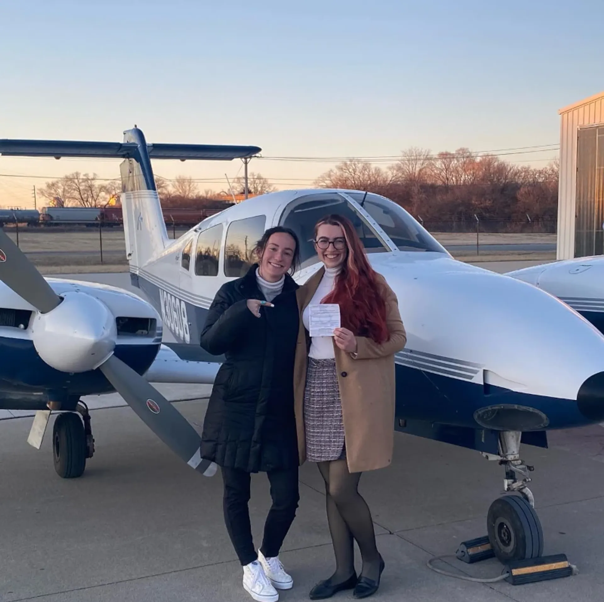 SimpliFly Flight School Team at the runway